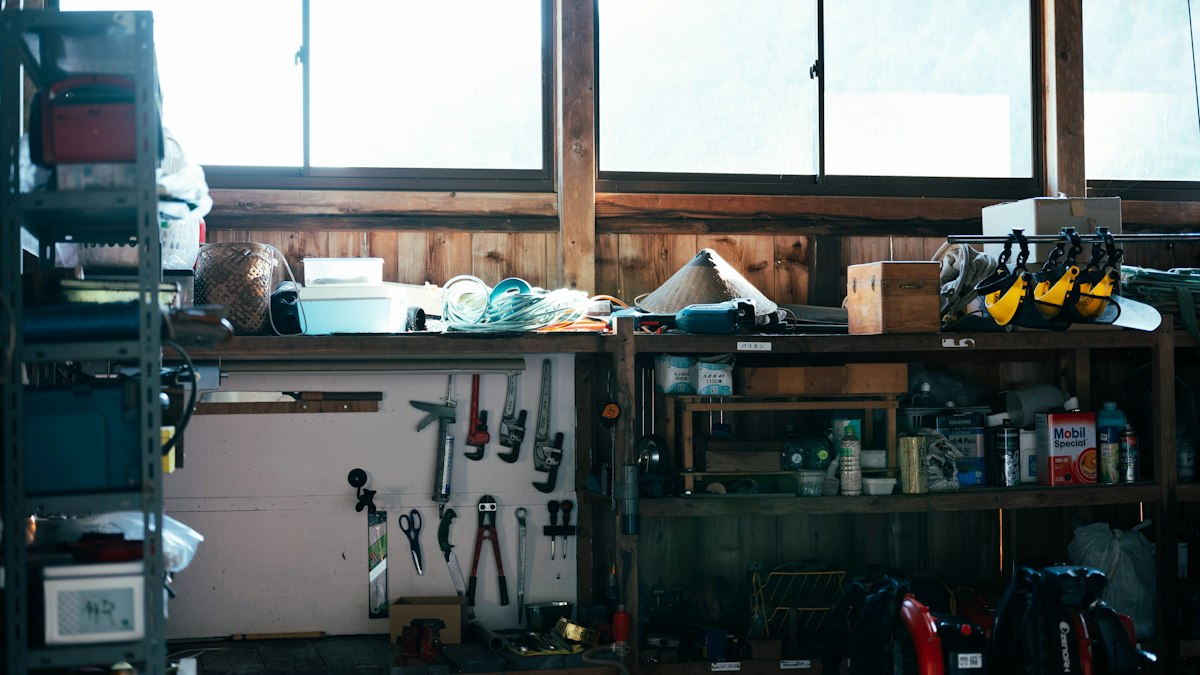 Garage workshop shelves with tools and supplies